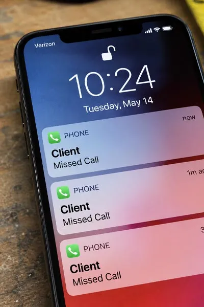 Phone screen showing multiple missed calls from a client